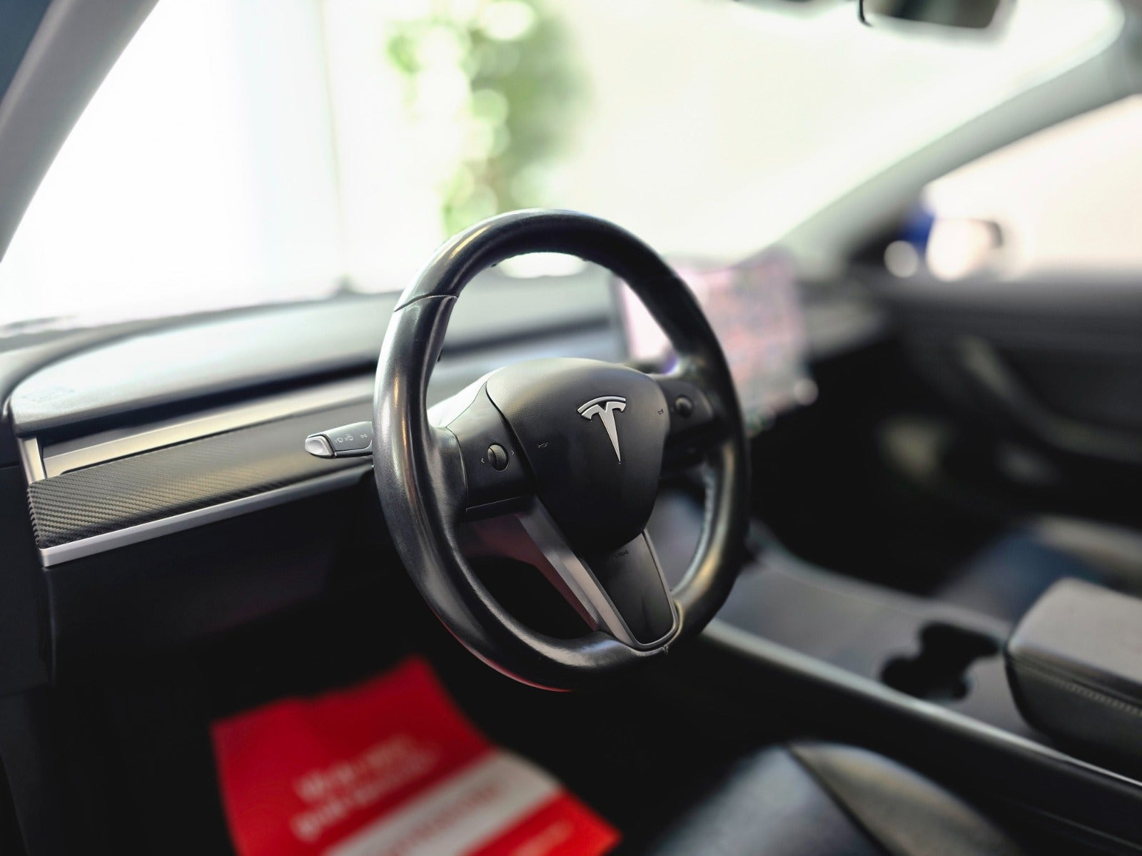 Blå Tesla Model 3 fra 2019