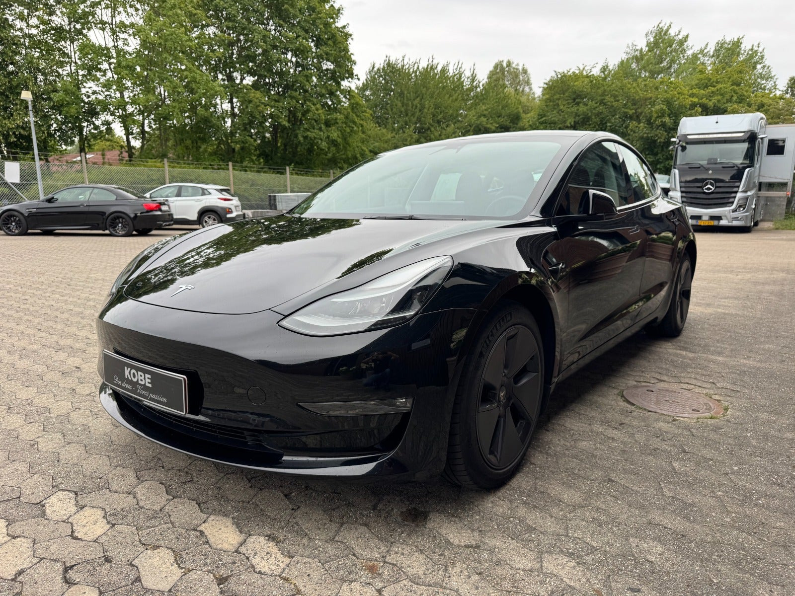 Sort Tesla Model 3 fra 2023