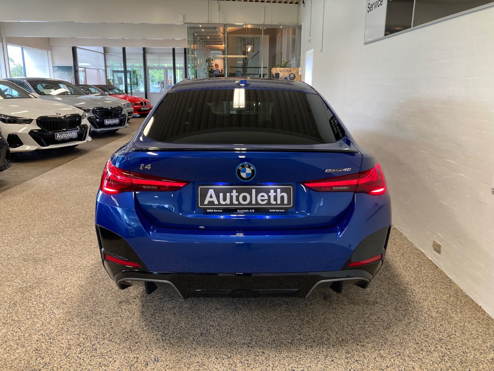 Blå BMW i4 fra 2025