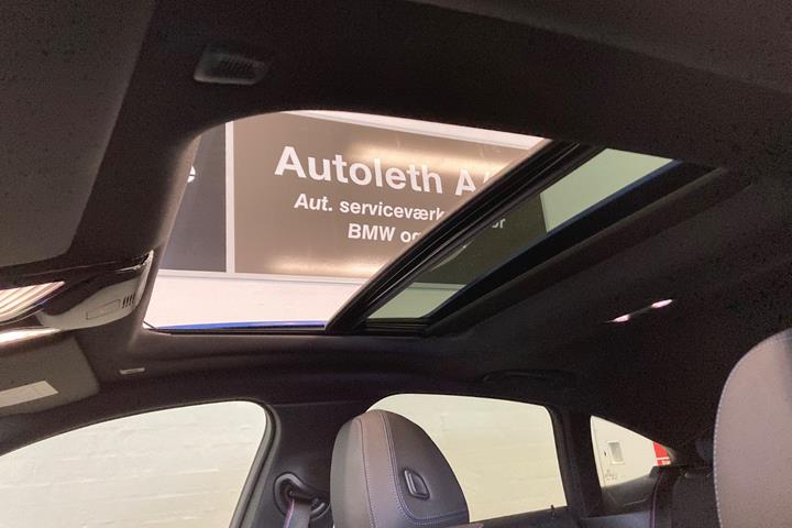 Blå BMW i4 fra 2025