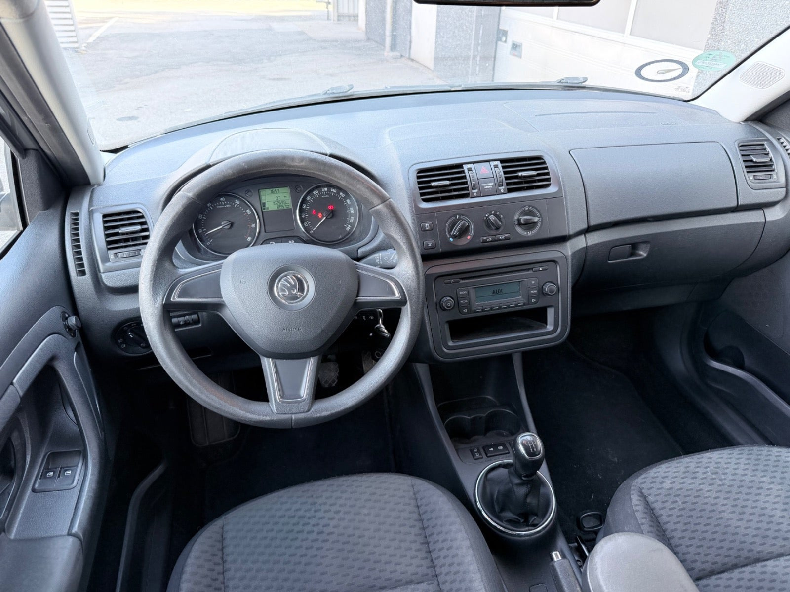 Orange Skoda Fabia fra 2015