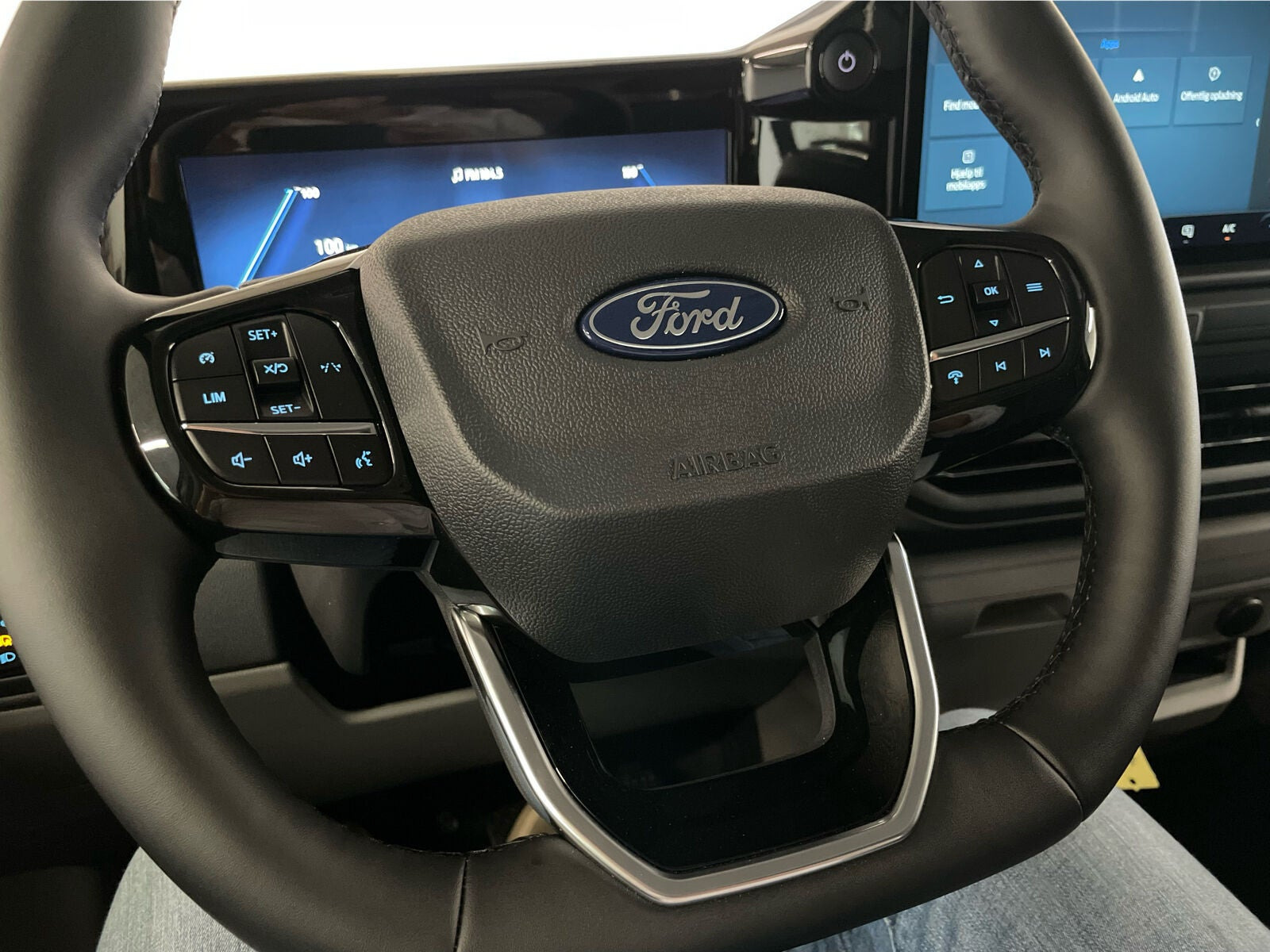 Grå Ford E-Transit Custom 320 L1 fra 2026