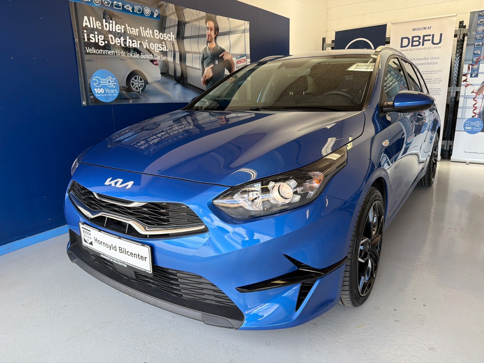 Blå Kia Ceed fra 2024
