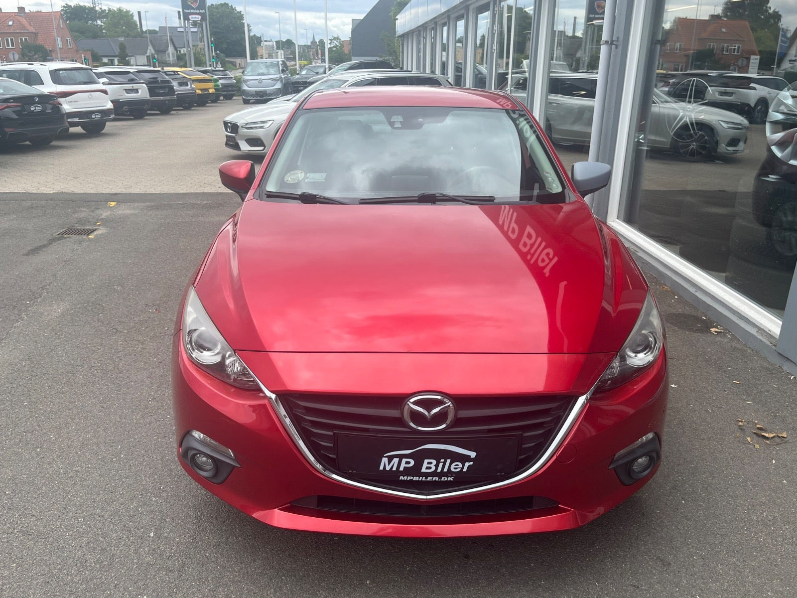 Rød Mazda 3 fra 2015