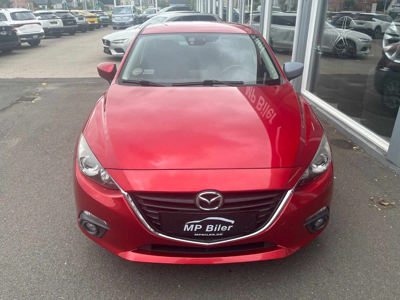Rød Mazda 3 fra 2015