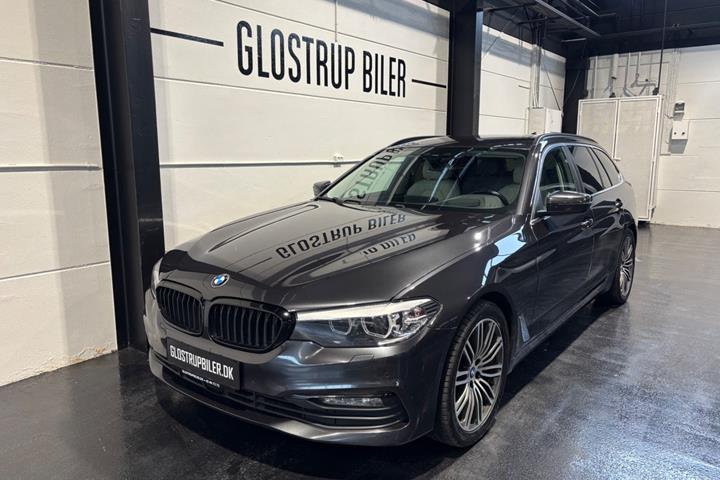 Grå BMW 520d fra 2018