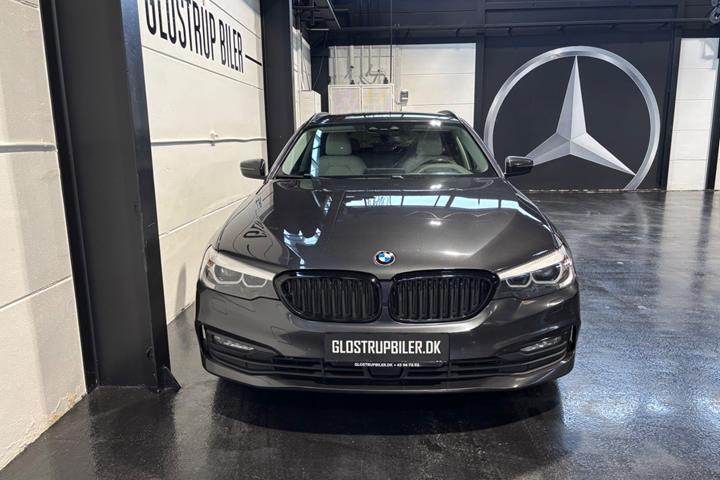 Grå BMW 520d fra 2018