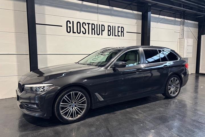 Grå BMW 520d fra 2018