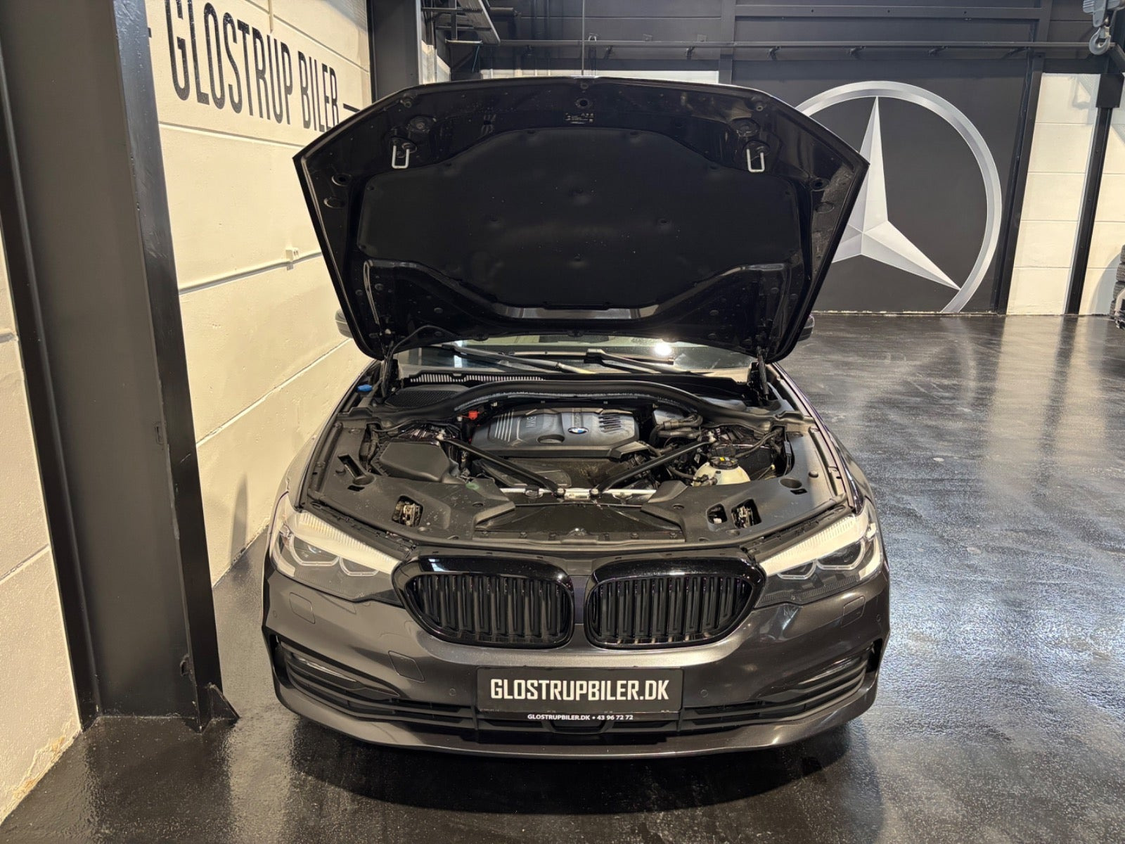 Grå BMW 520d fra 2018