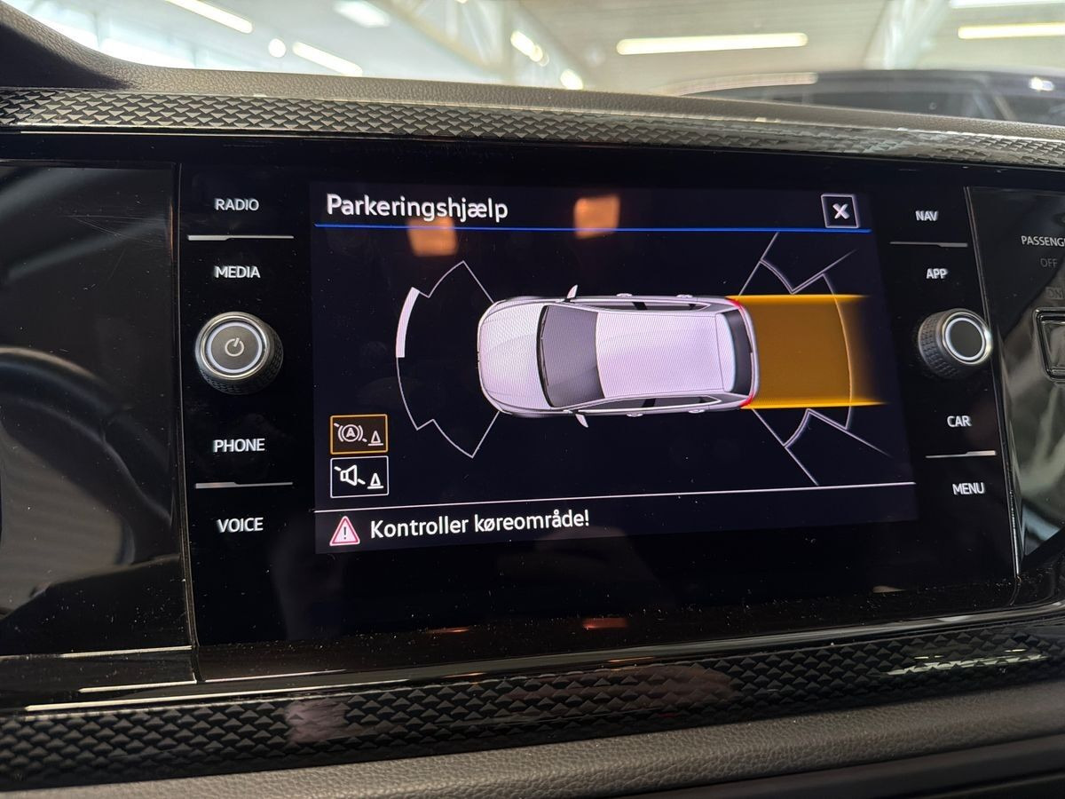 Sølv VW Polo fra 2023