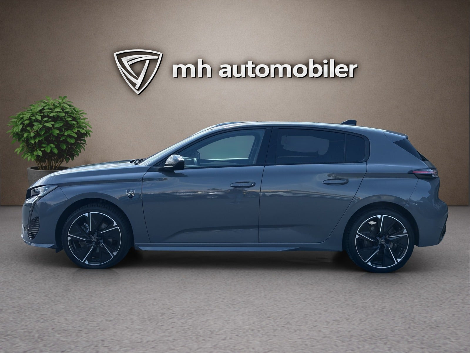 Grå Peugeot E-308 fra 2024