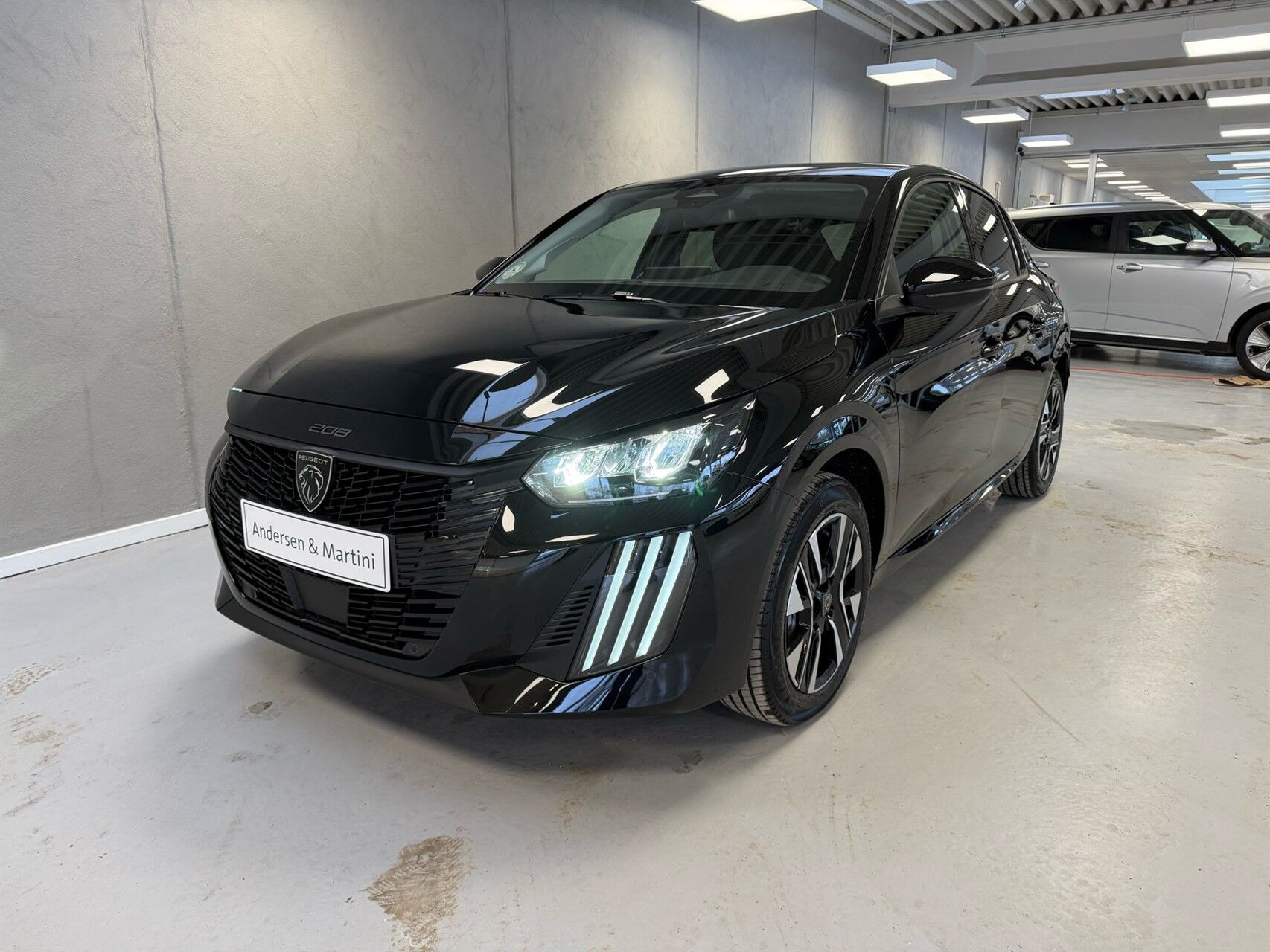 Sort Peugeot e-208 fra 2026