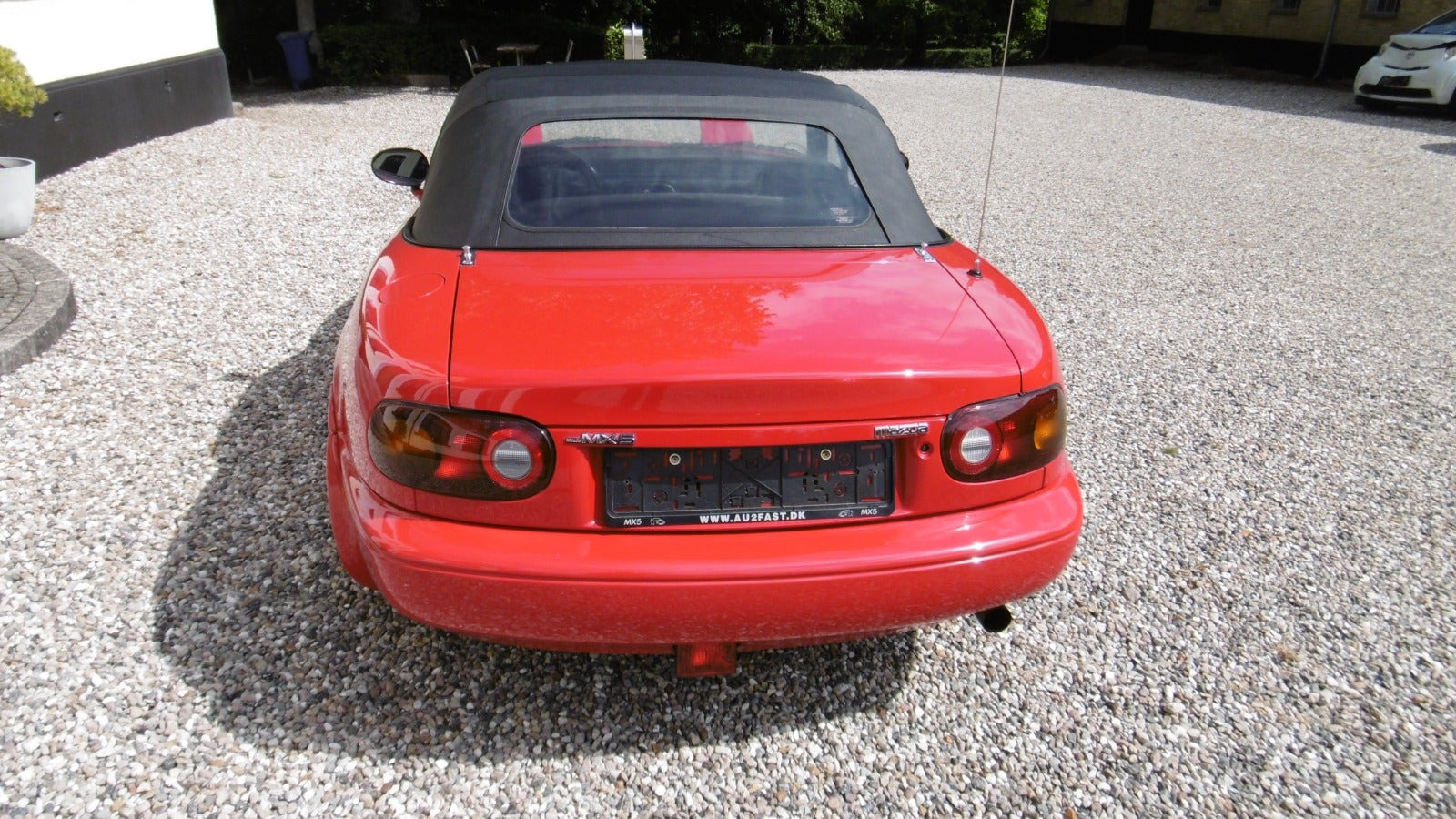 Rød Mazda MX-5 fra 1991