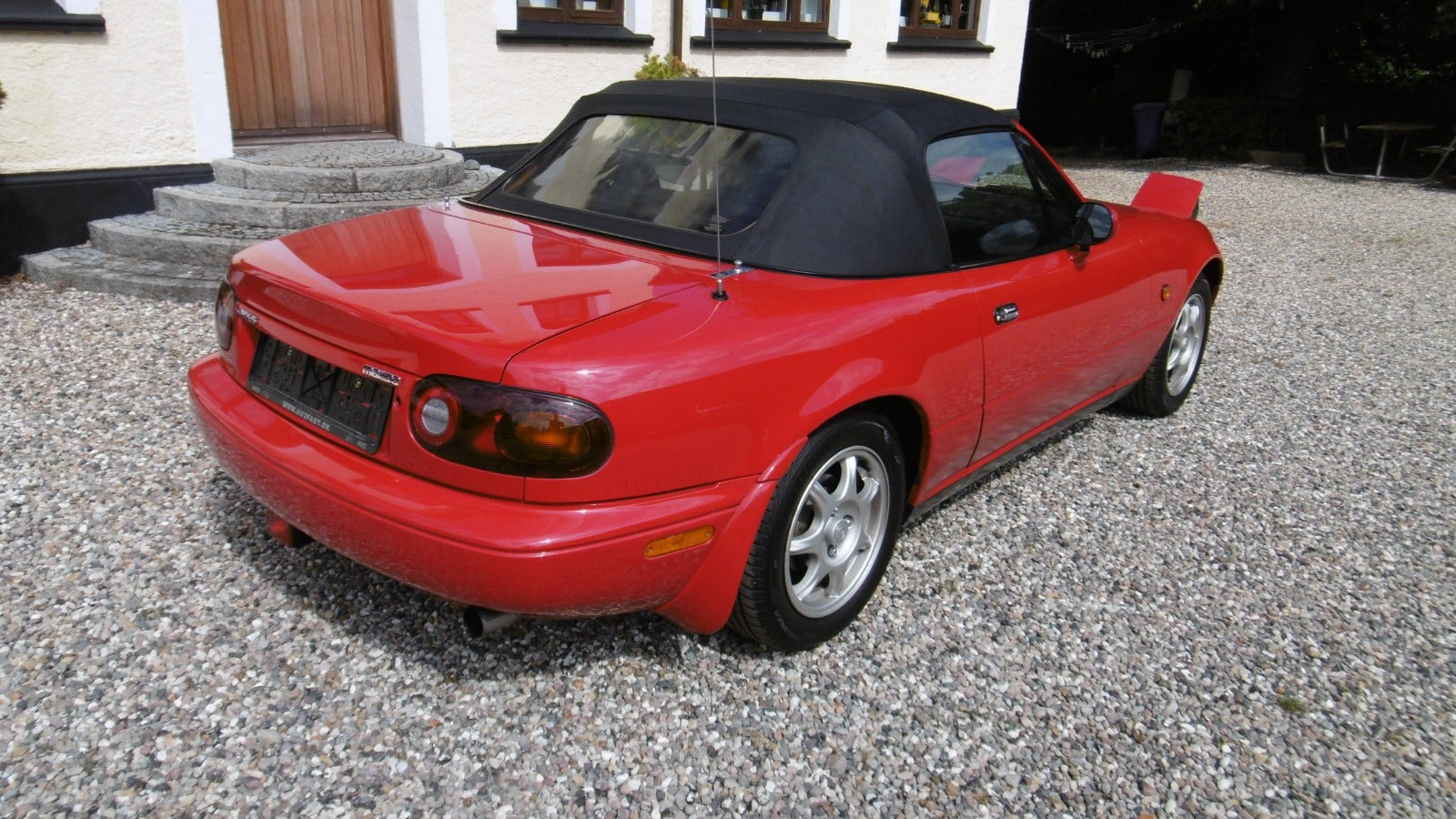 Rød Mazda MX-5 fra 1991