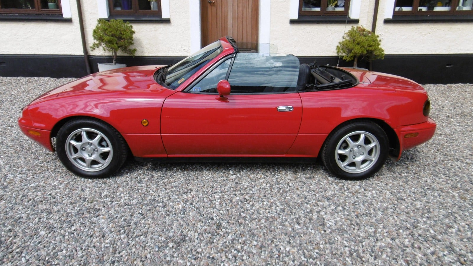 Rød Mazda MX-5 fra 1991