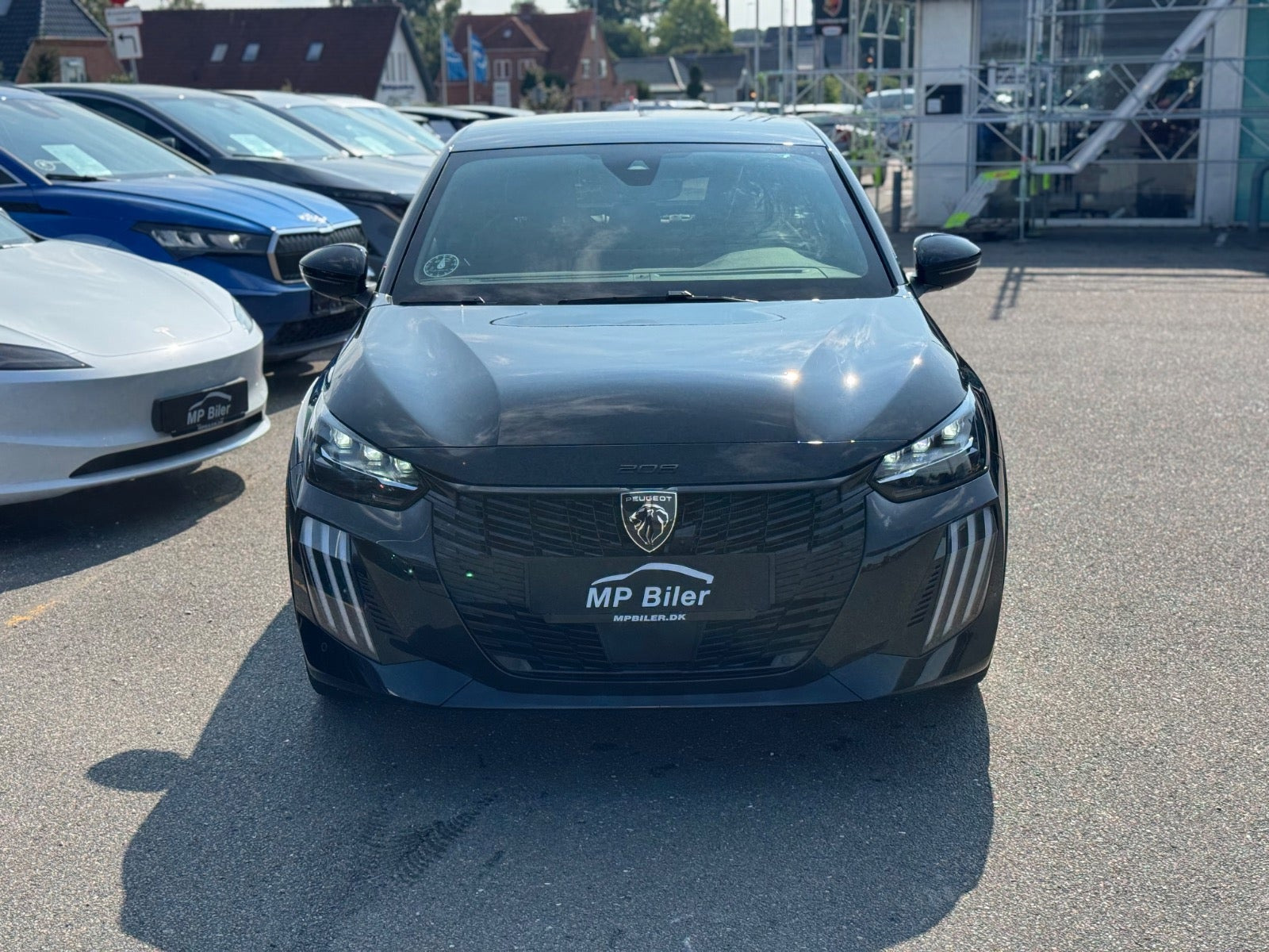 Sort Peugeot e-208 fra 2024