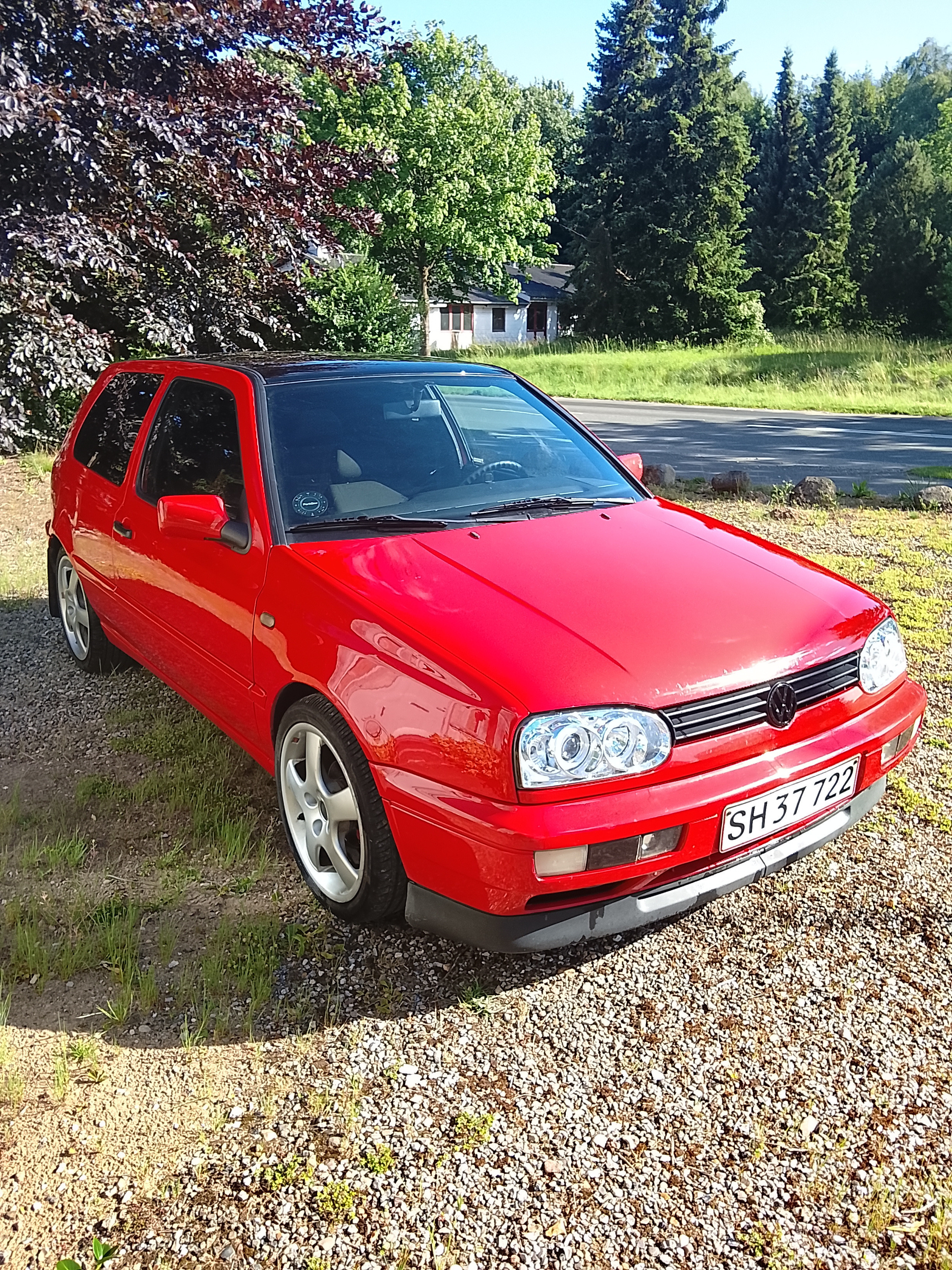 Rød VW Golf fra 1997
