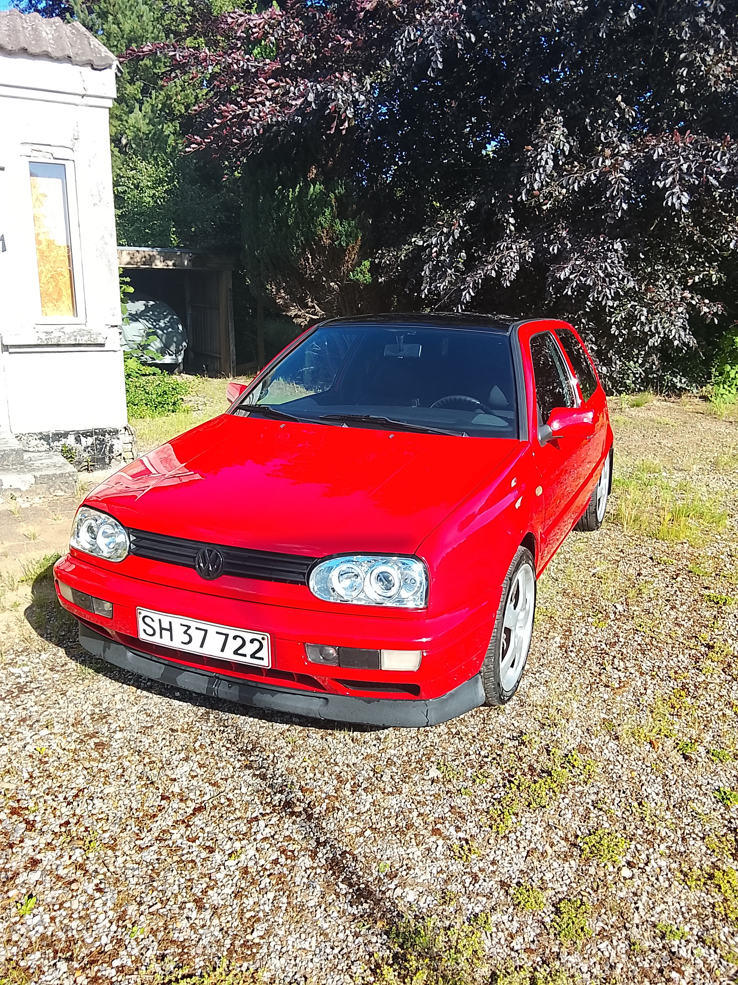 Rød VW Golf fra 1997