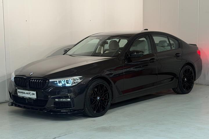 Rød BMW 530d fra 2017