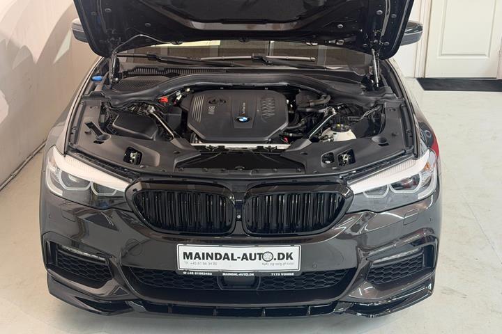 Rød BMW 530d fra 2017