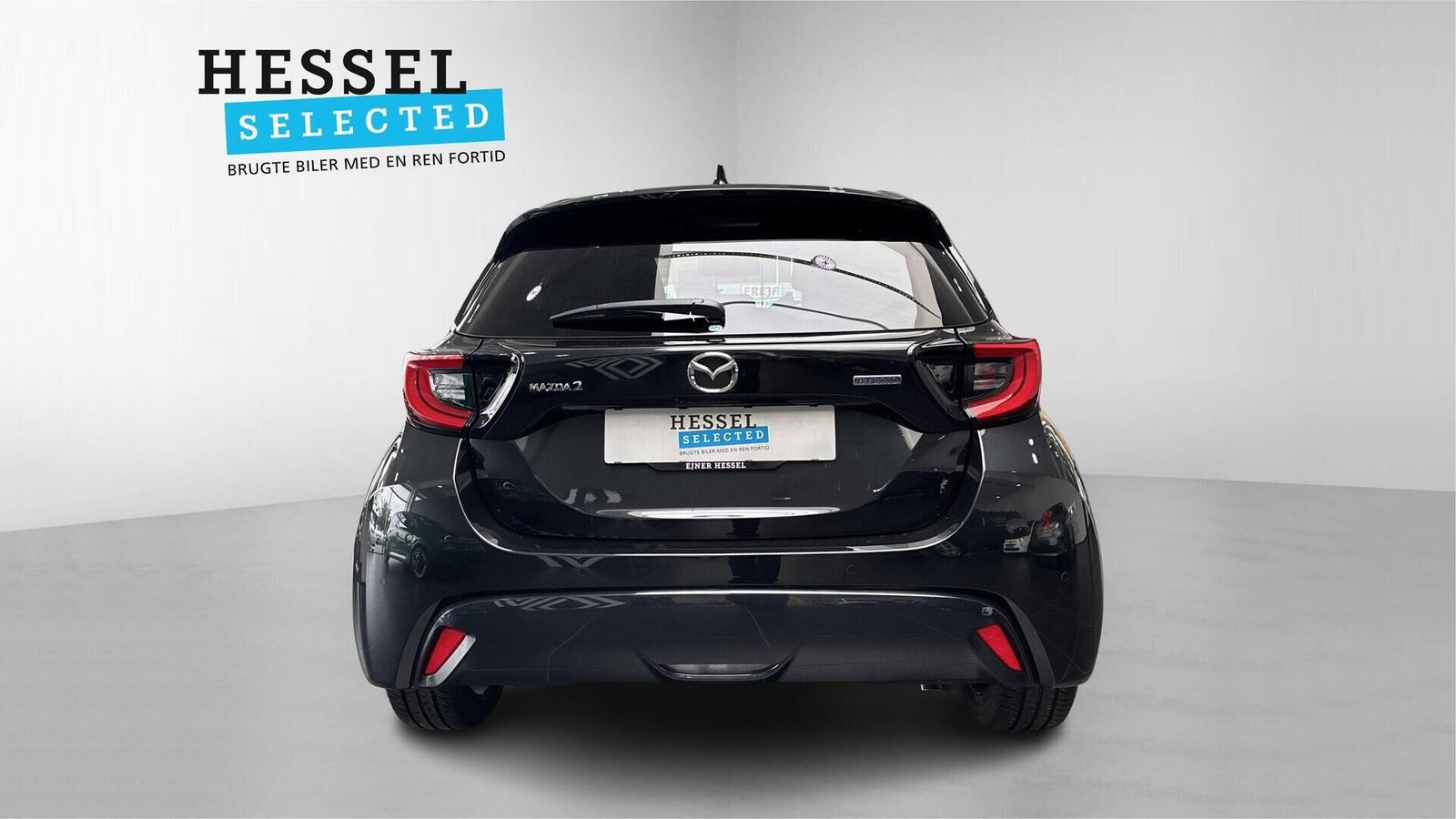 Beige Mazda 2 fra 2024