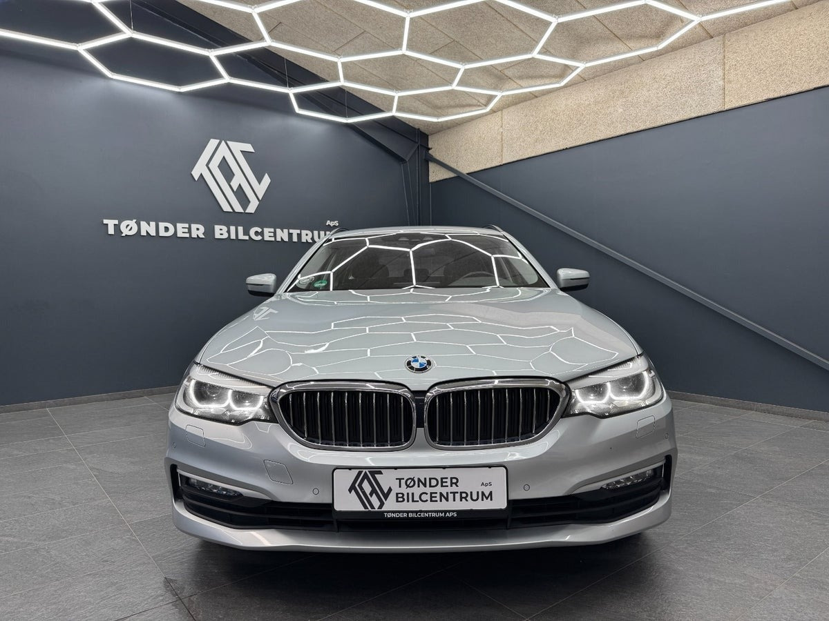 Sølv BMW 520d fra 2018
