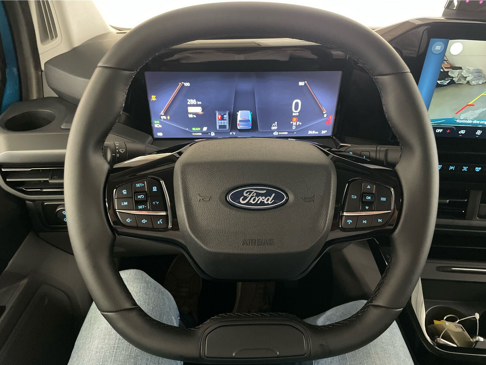 Blå Ford E-Transit Custom 320 L1 fra 2026