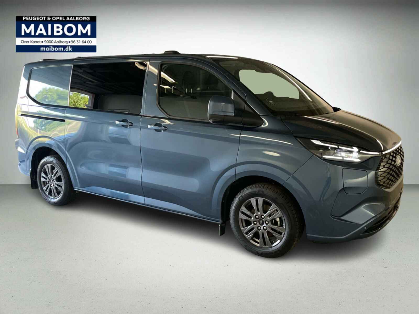 Blå Ford E-Transit Custom 320 L1 fra 2026