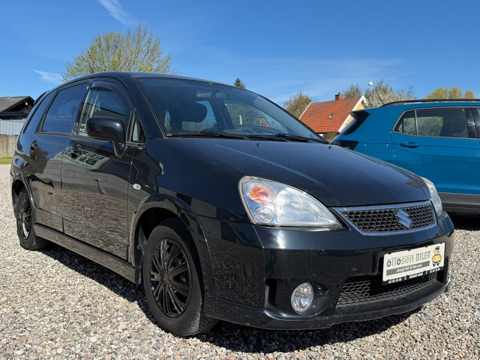Beige Suzuki Liana fra 2009