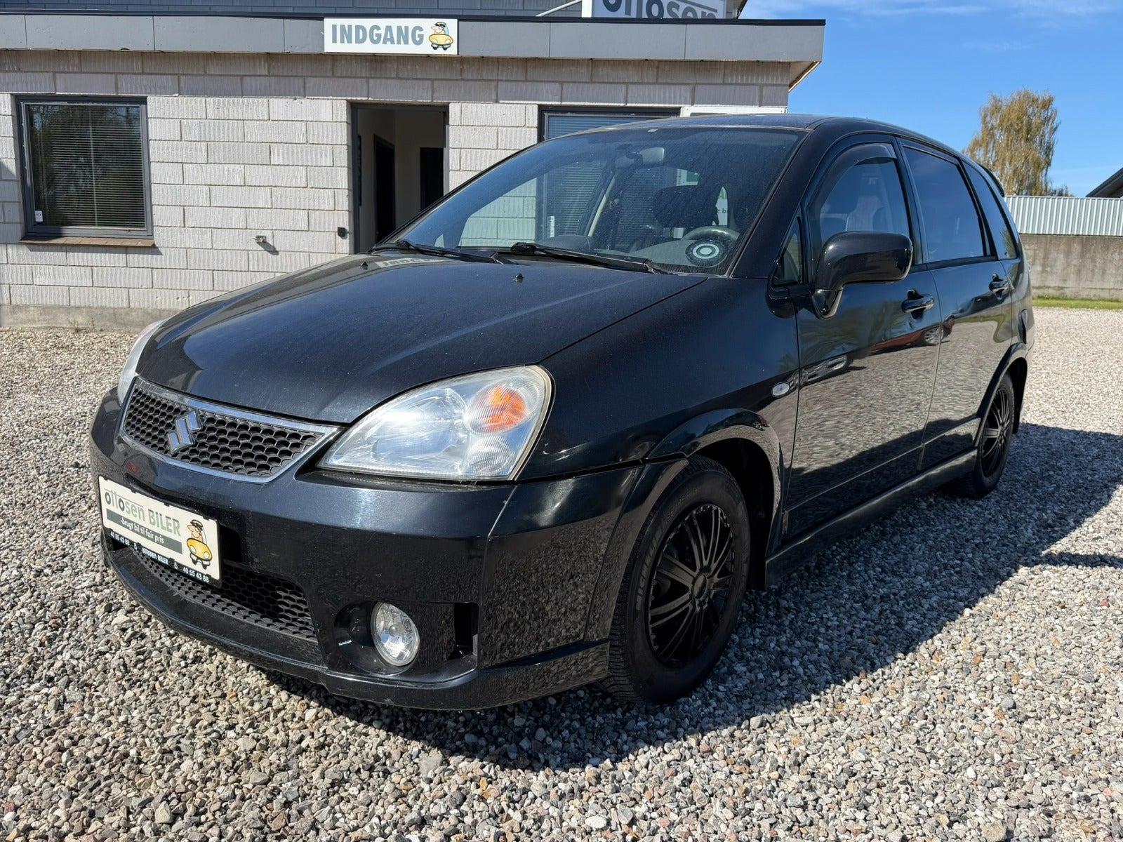 Beige Suzuki Liana fra 2009