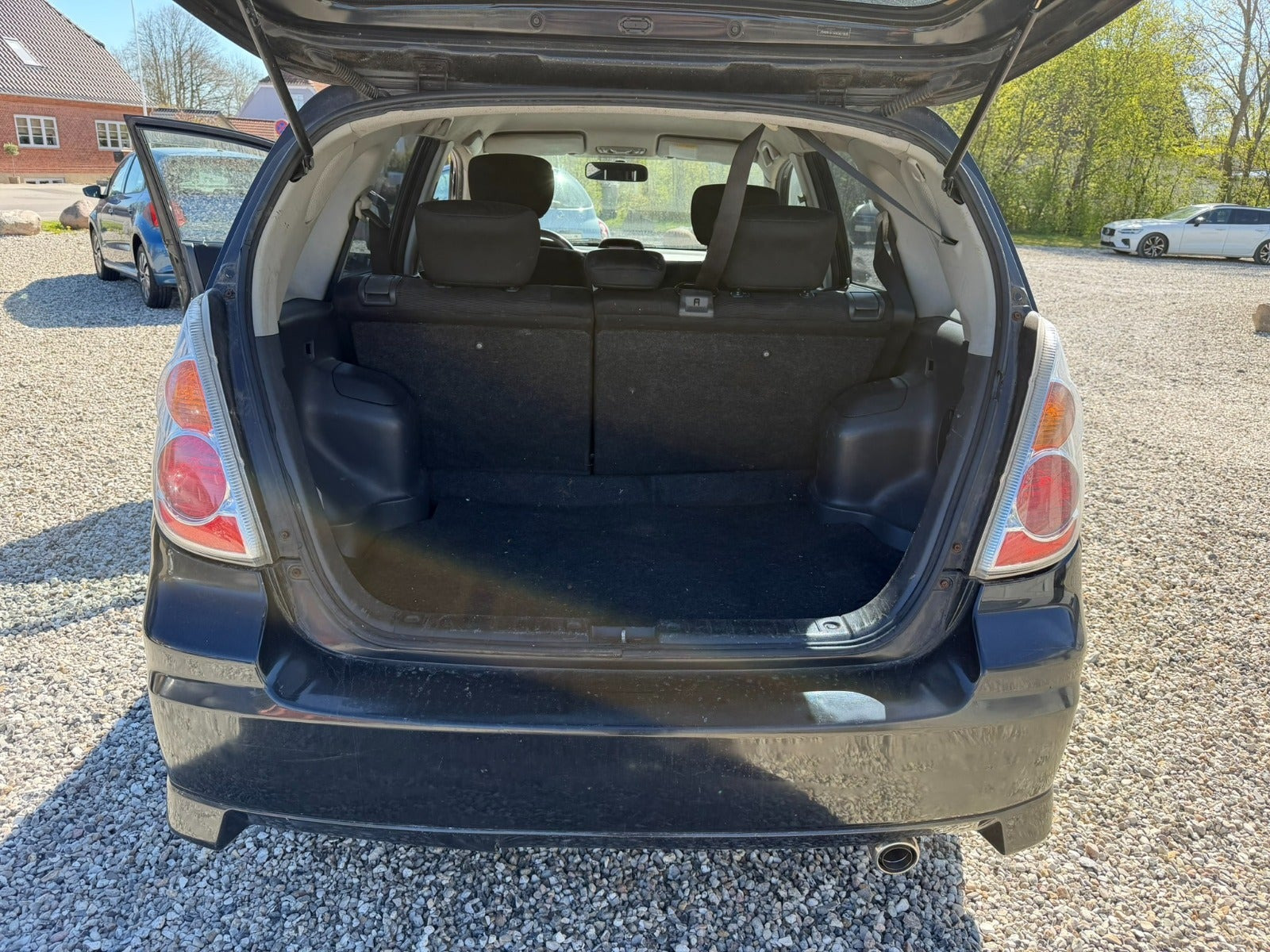 Beige Suzuki Liana fra 2009