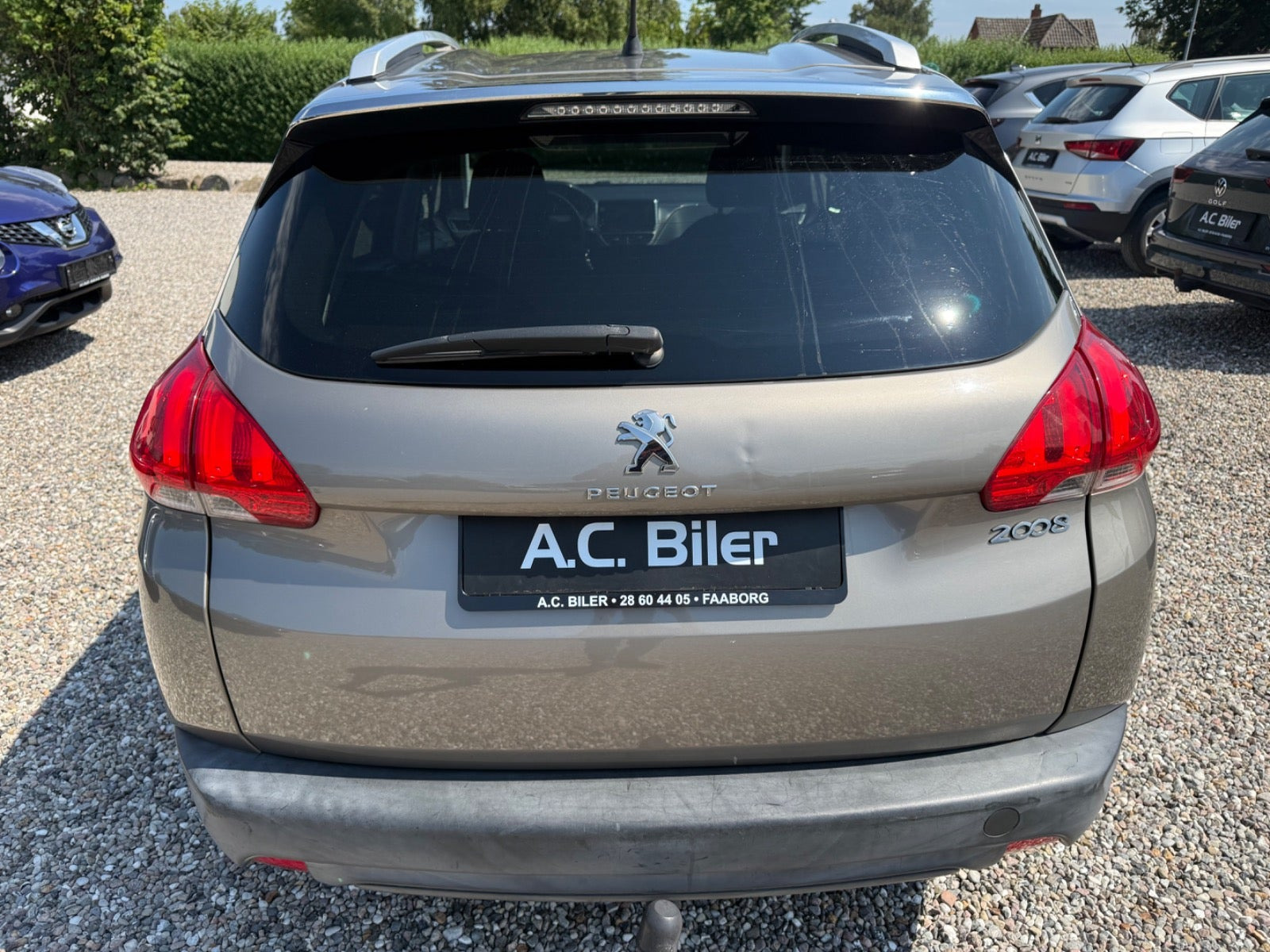 Orange Peugeot 2008 fra 2014