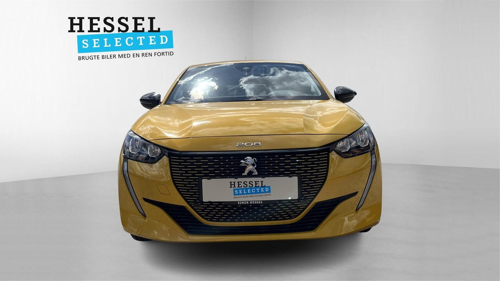 Gul Peugeot e-208 fra 2023