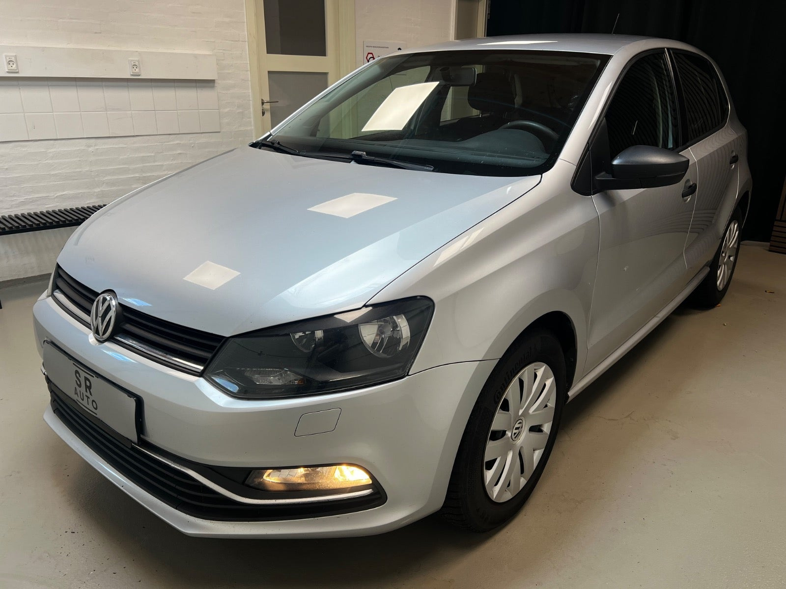 Sølv VW Polo fra 2014