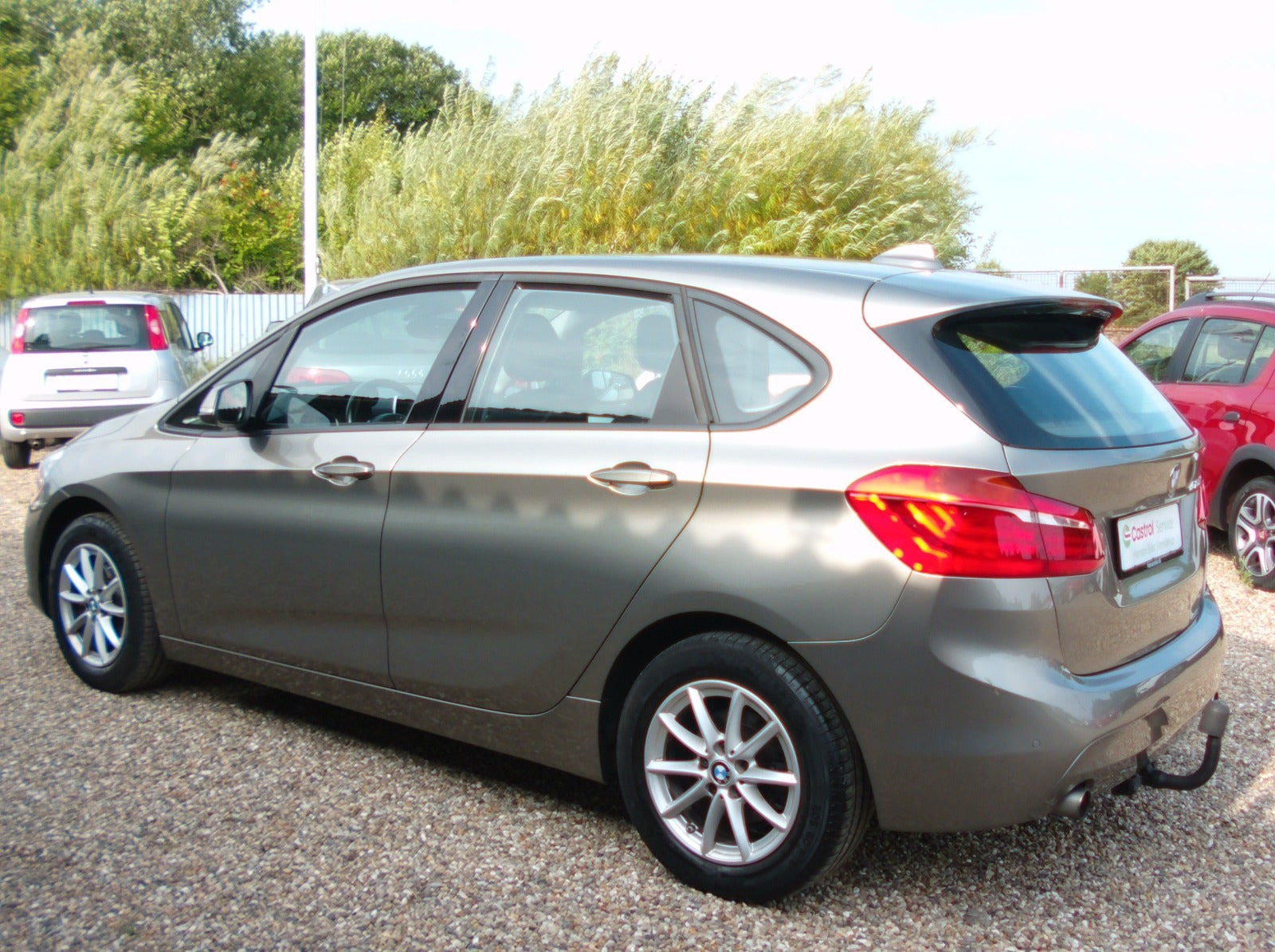 Beige BMW 220i fra 2018
