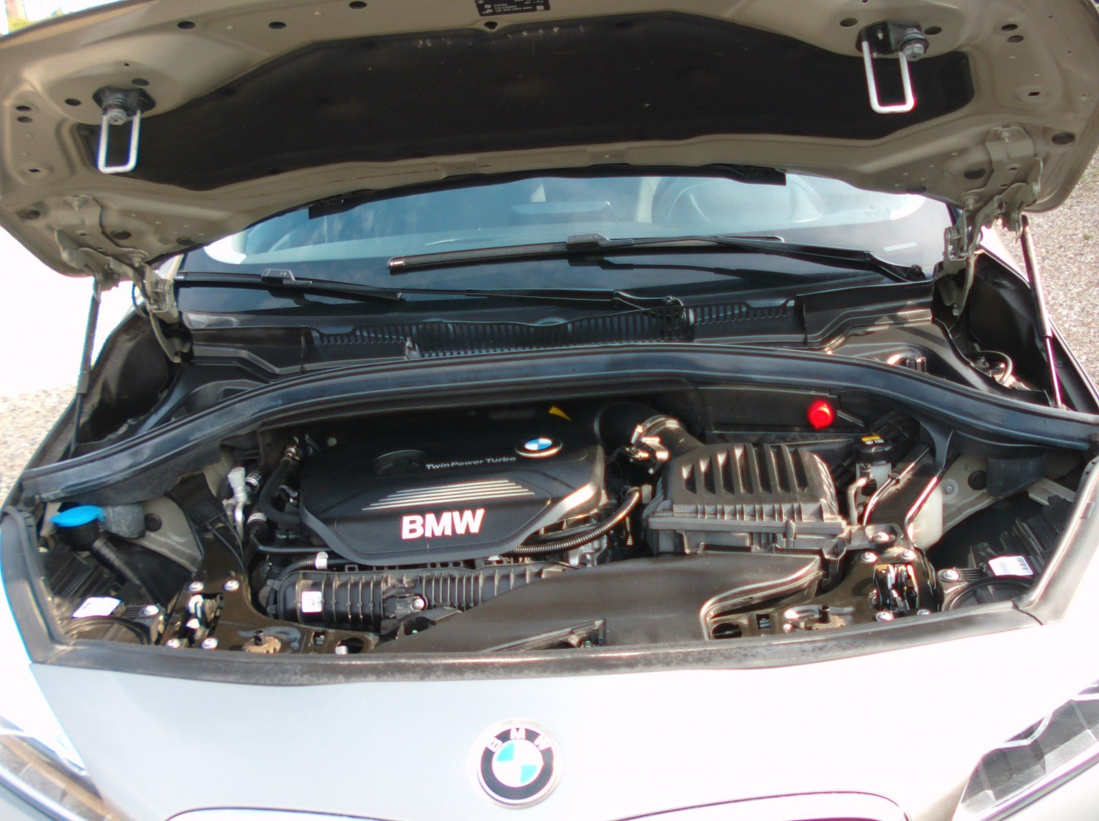 Beige BMW 220i fra 2018