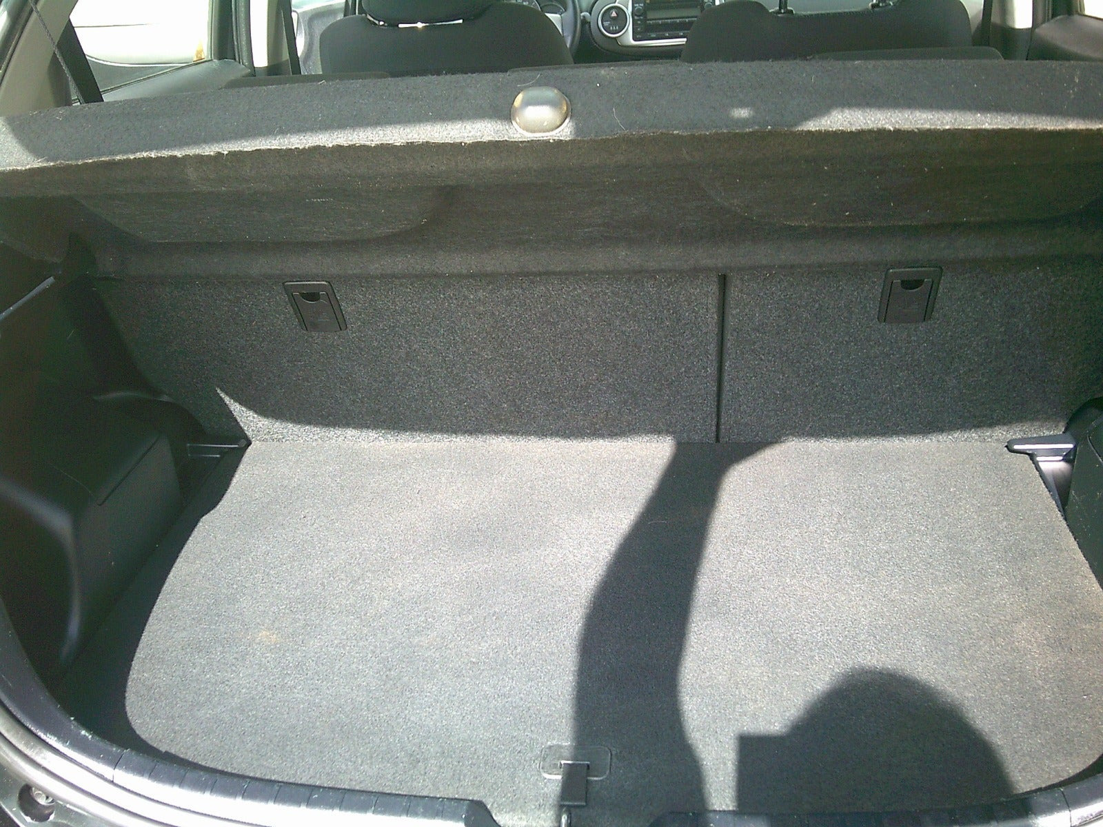 Gul Toyota Yaris fra 2011