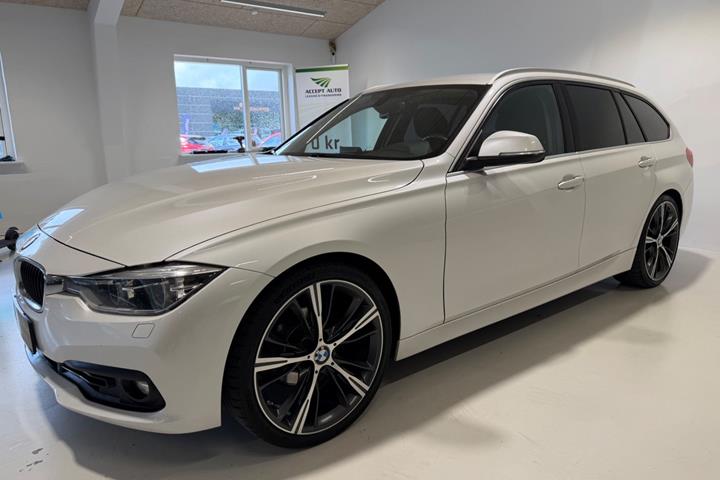 Hvid BMW 320i fra 2018