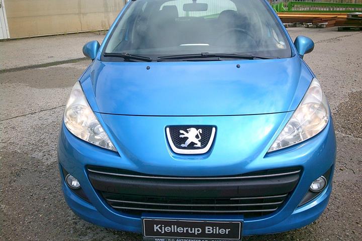 Gul Peugeot 207 fra 2012
