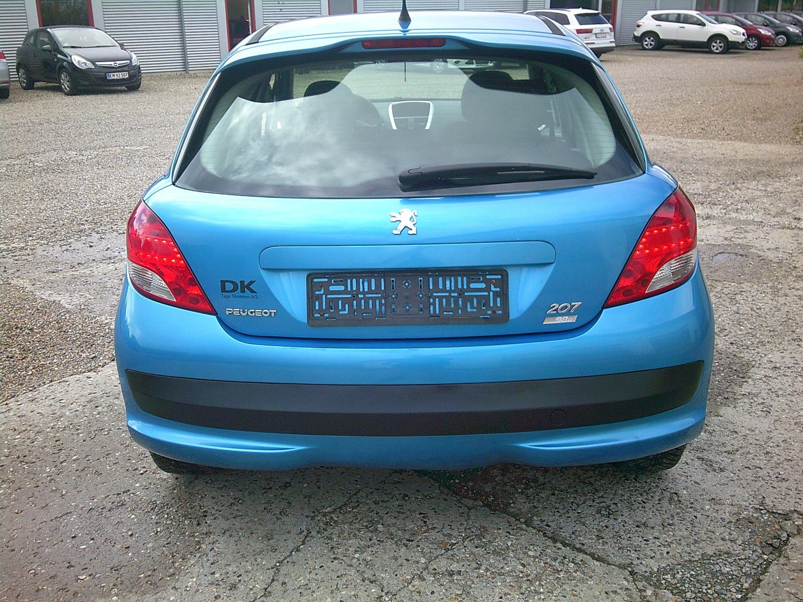 Gul Peugeot 207 fra 2012