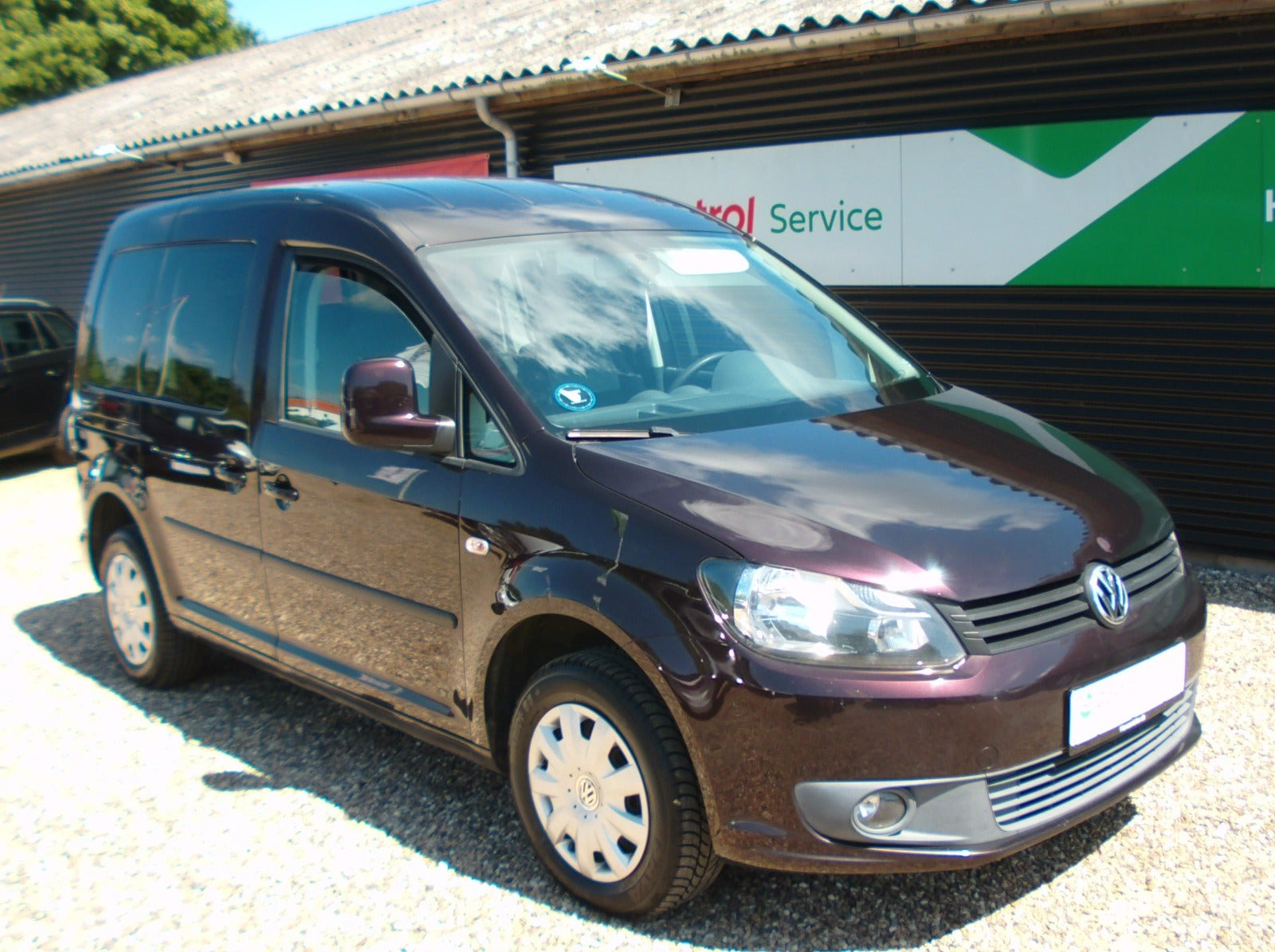 Grå VW Caddy fra 2011