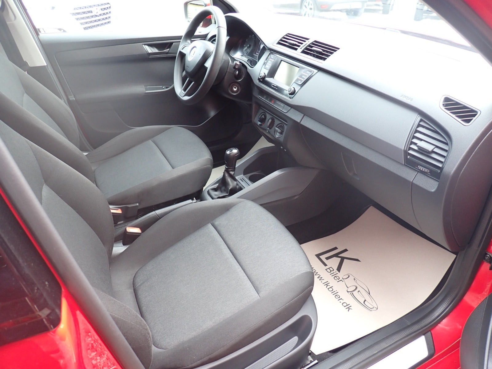 Rød Skoda Fabia fra 2015