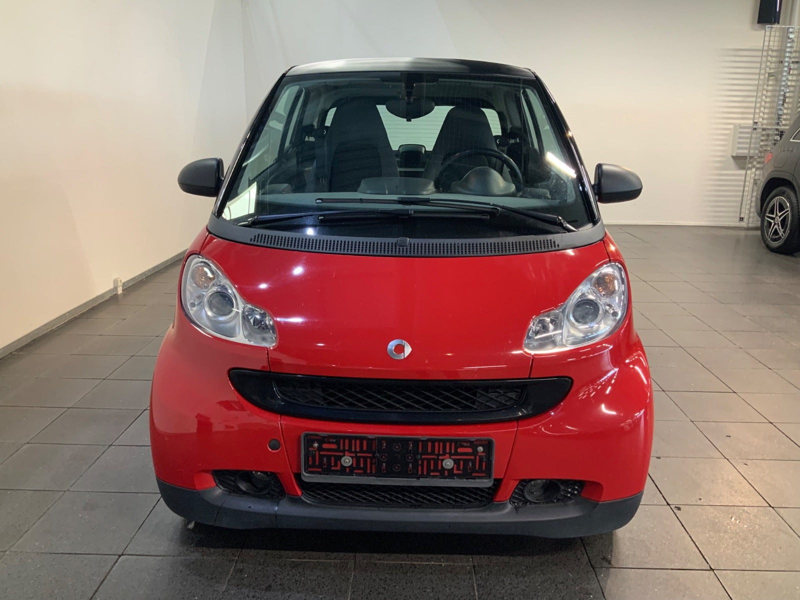 Rød Smart ForTwo Coupé fra 2009