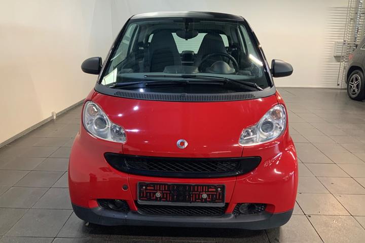 Rød Smart ForTwo Coupé fra 2009