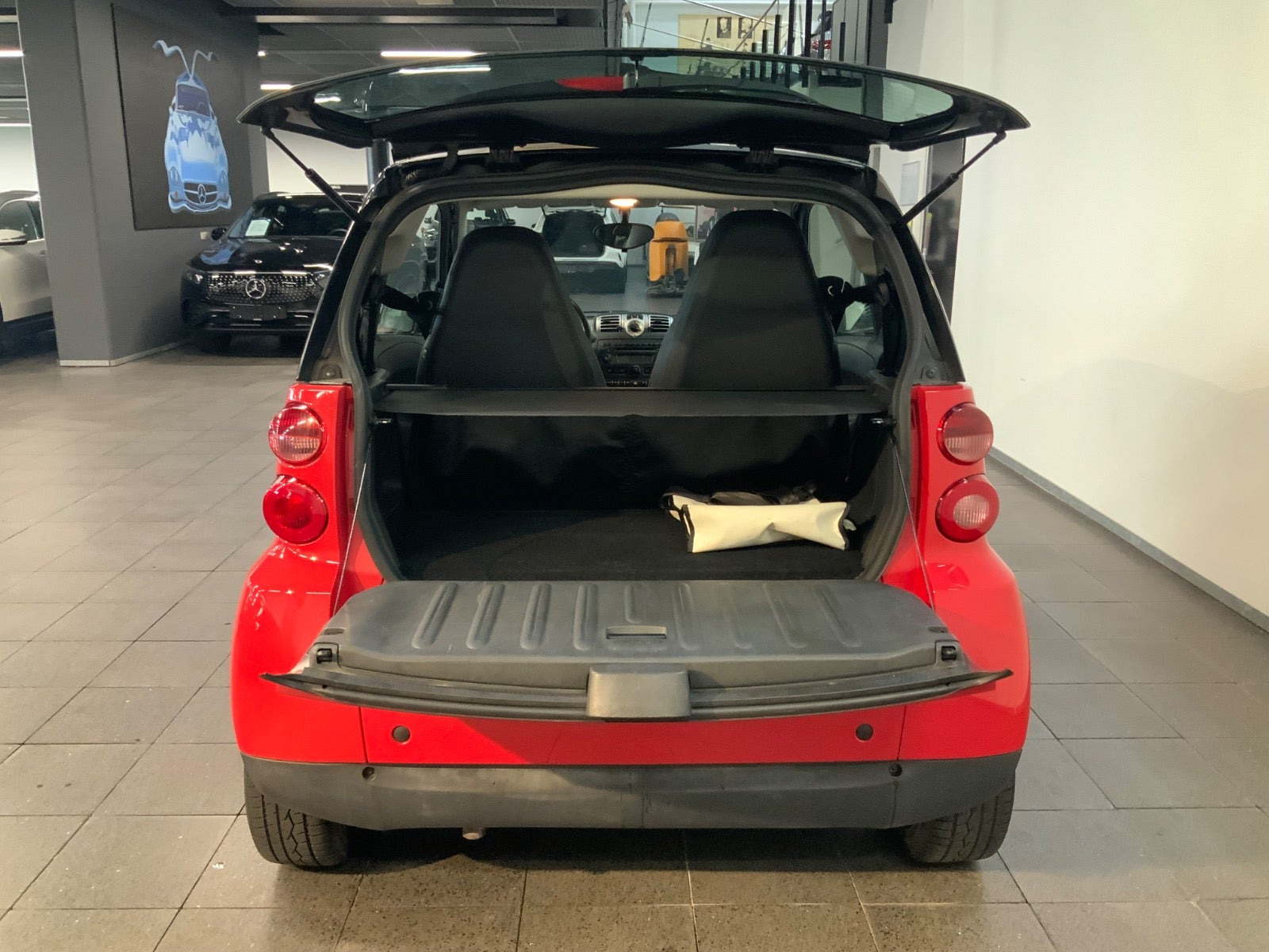 Rød Smart ForTwo Coupé fra 2009