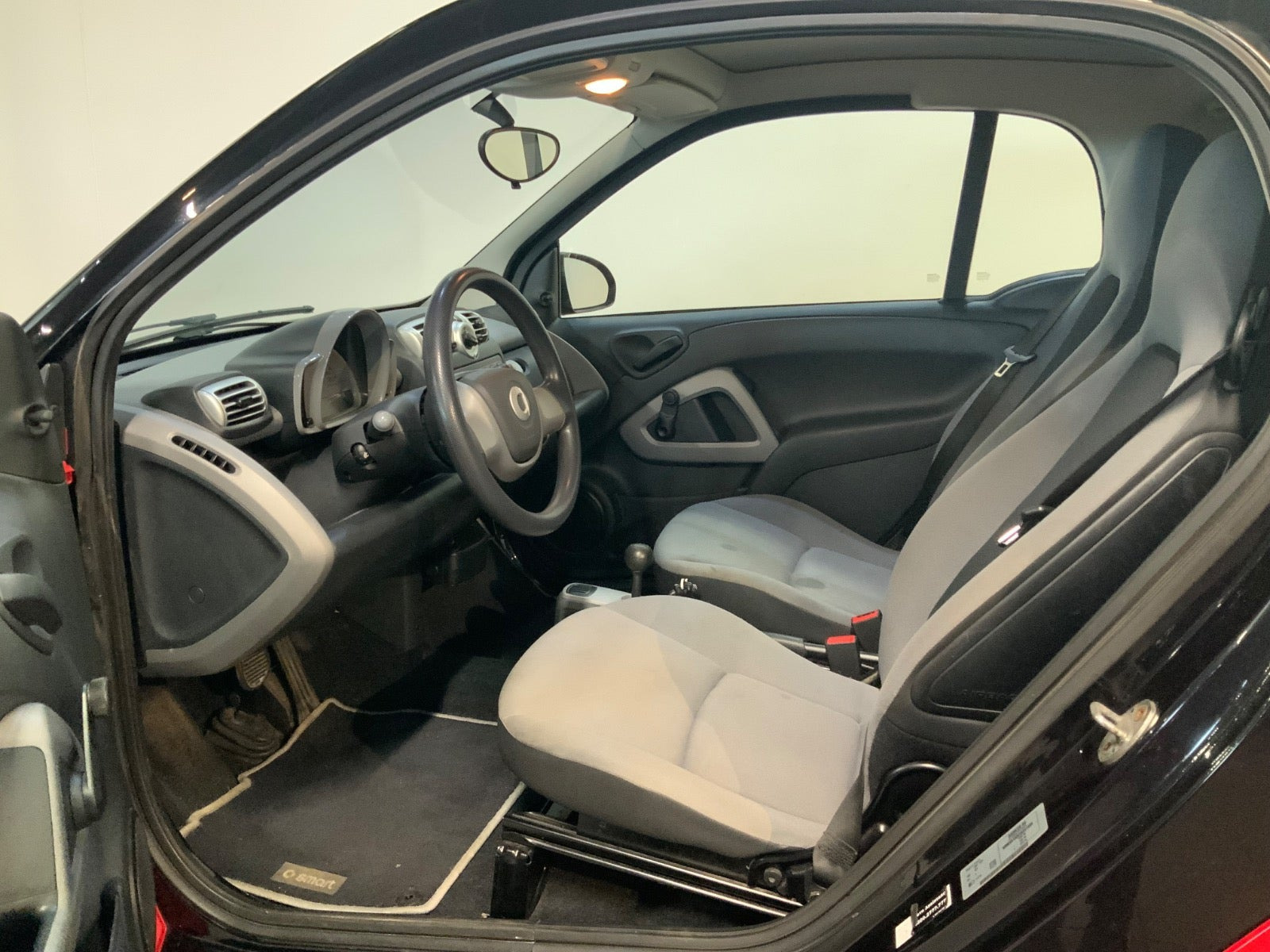Rød Smart ForTwo Coupé fra 2009