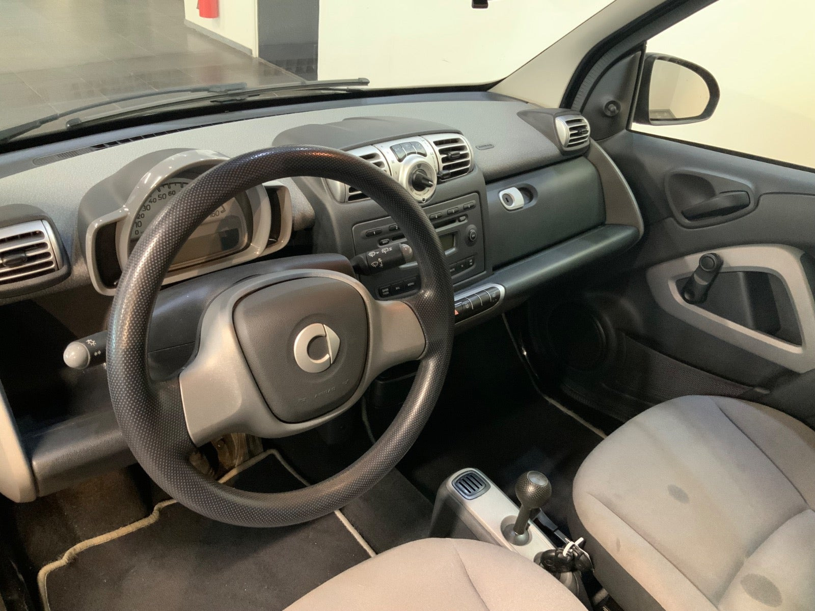 Rød Smart ForTwo Coupé fra 2009