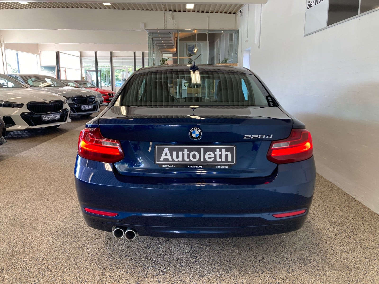 Blå BMW 220d fra 2016
