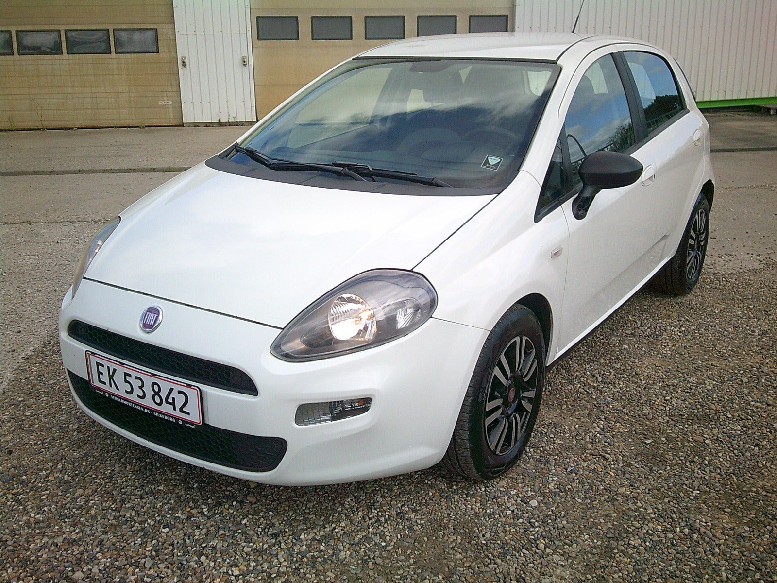 Gul Fiat Punto fra 2012