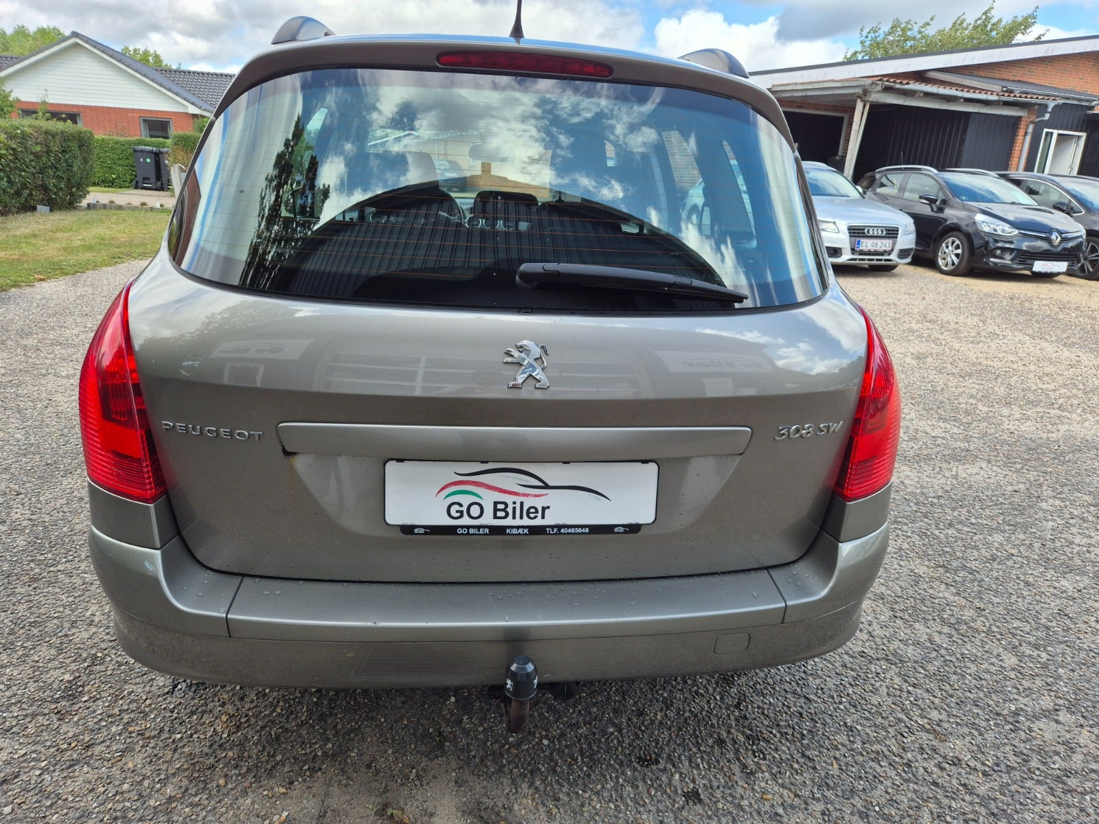 Grøn Peugeot 308 fra 2010